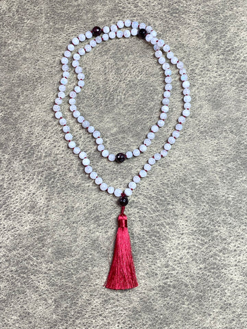 mala: moonstone with garnet, knotted