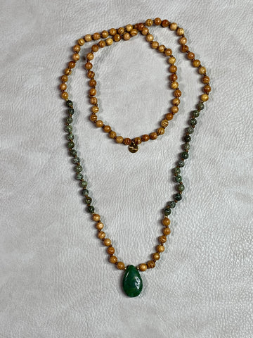 mala: sandalwood and jade beads with jade guru bead, knotted
